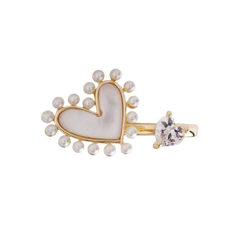 Small design retro universal ring from pearl, flowered, simple and elegant design, on index finger