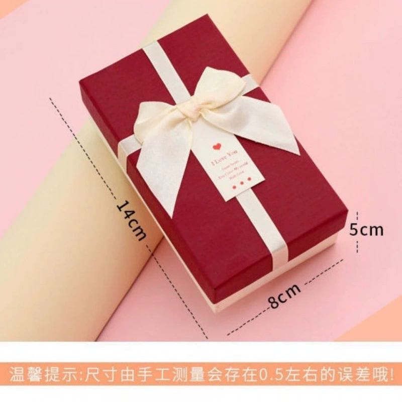 Rectangular lipstick with bow, cosmetic perfume, gift box