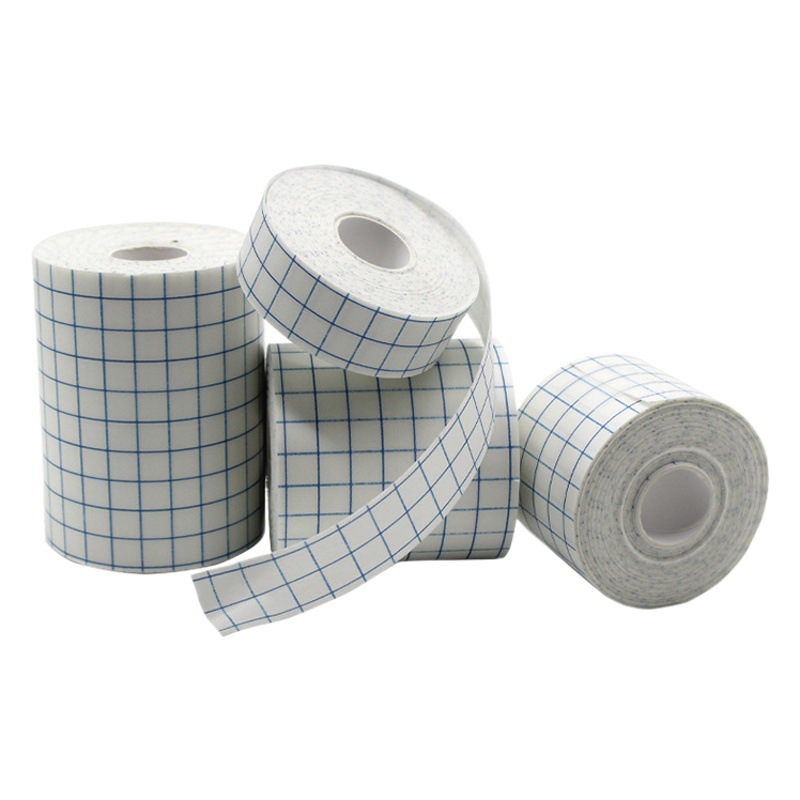 Fábrica al por mayor pegatinas de vestir fuerte adhesivo vendaje spunlace no tejido transpirable rollo de vestir pegatinas impermeables