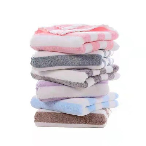 Manufacturer wholesale warp knitted colorful striped coral velvet towel soft absorbent face towel cationic striped floor stall towel