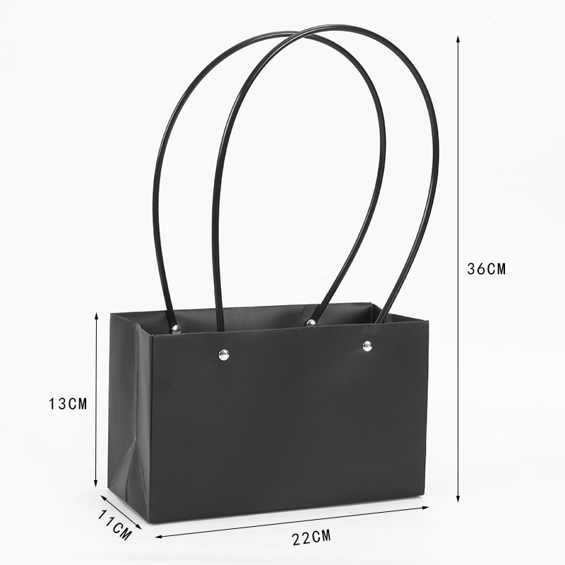 Gran cantidad y excelente precio de fábrica de ventas directas de todo tipo de película de plástico impermeable de papel Kraft bolsa de flores portátil diosa festival bolsa de ramo