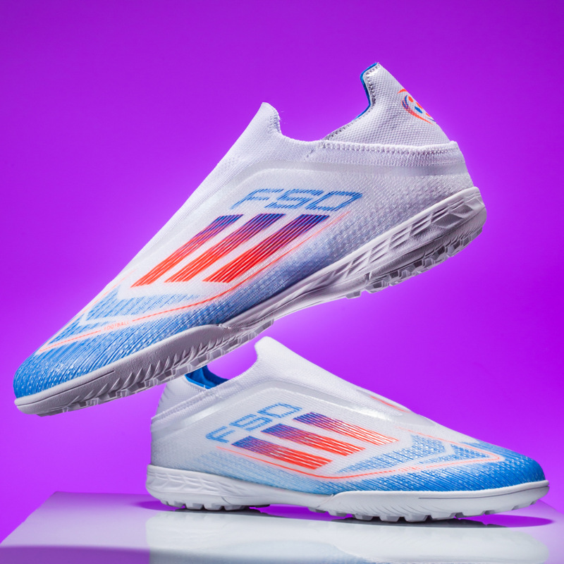 Copa del Mundo transfronteriza F50 zapatos de fútbol estudiantes adolescentes hombres zapatos de entrenamiento de entrenamiento de entrenamiento de clavos al por mayor