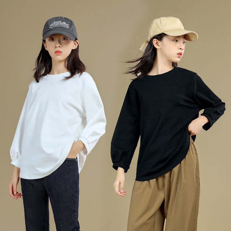 Camisa base para niñas 2023 otoño nuevo color sólido para niños negro blanco cuello redondo Camiseta estilo coreano versátil manga larga superior