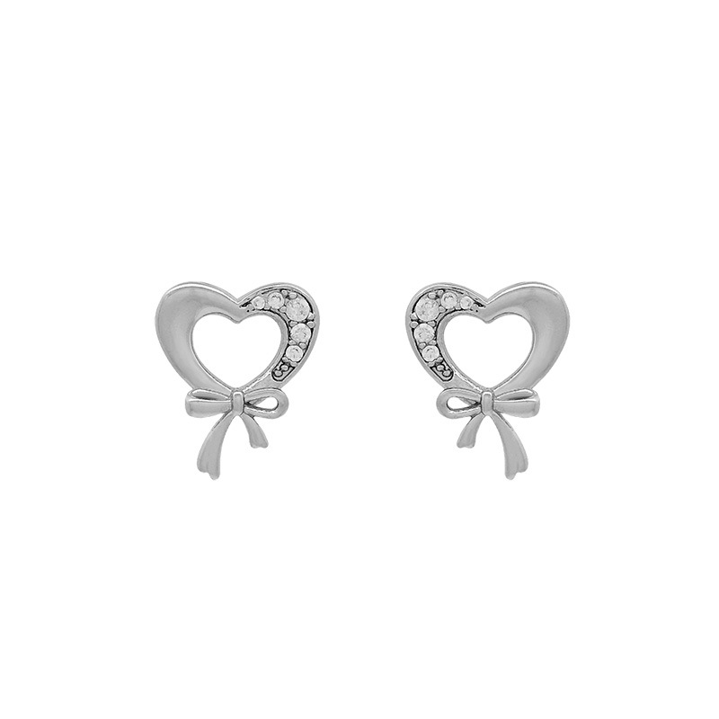 Pendientes pequeños personalizados con forma de corazón y lazo, chapados en oro blanco, con gemas artificiales, estilo europeo y americano, de Xuping, para uso diario, para mujer.