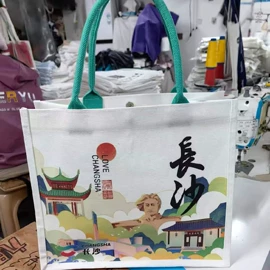 围裙、袖套;涤纶布袋;帆布袋