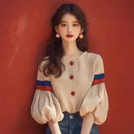 2026早秋新款法式小众设计感独特超好看洋气减龄杏色灯笼袖....