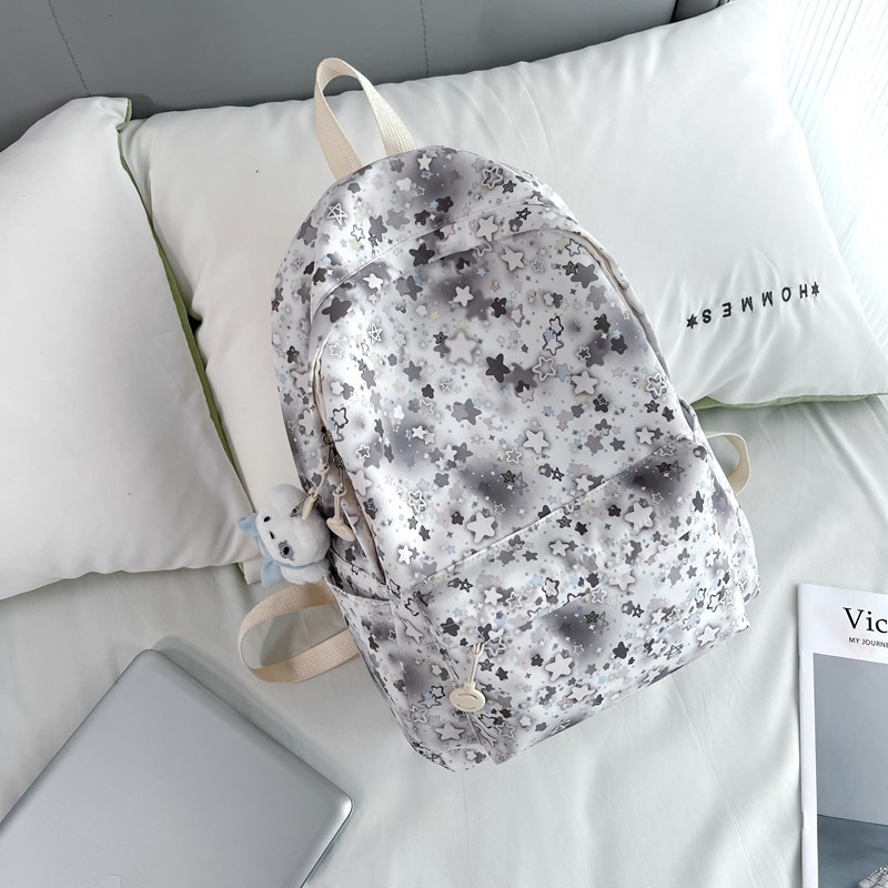 Mochila de estudiantes de alto valor de diseño de tendencia impresa de gran capacidad mochila de flores pequeñas estrellas mochila para mujeres image 13