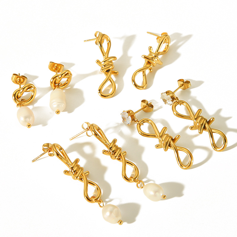 Nicho europeo y americano exagerado diseño mariposa pendientes de perlas pendientes de oro de 18k para mujeres simple joyas de orejas de acero inoxidable