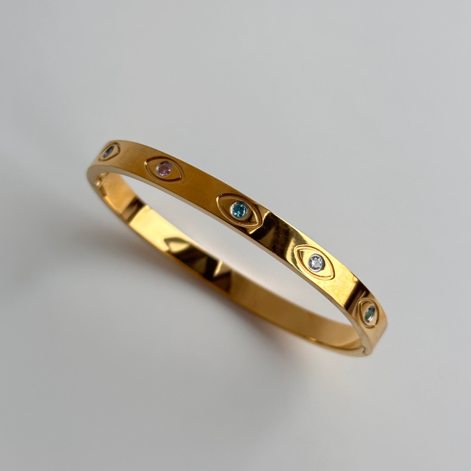 Zircon Inlay Material 18K Gold Plated 304 Stainless Steel PVD Coated Zircon Devil's Eye Bangle