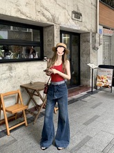 美式别致轻薄夏季不规则毛边裙裤2025夏屁帘假两件牛仔裤微喇裤女