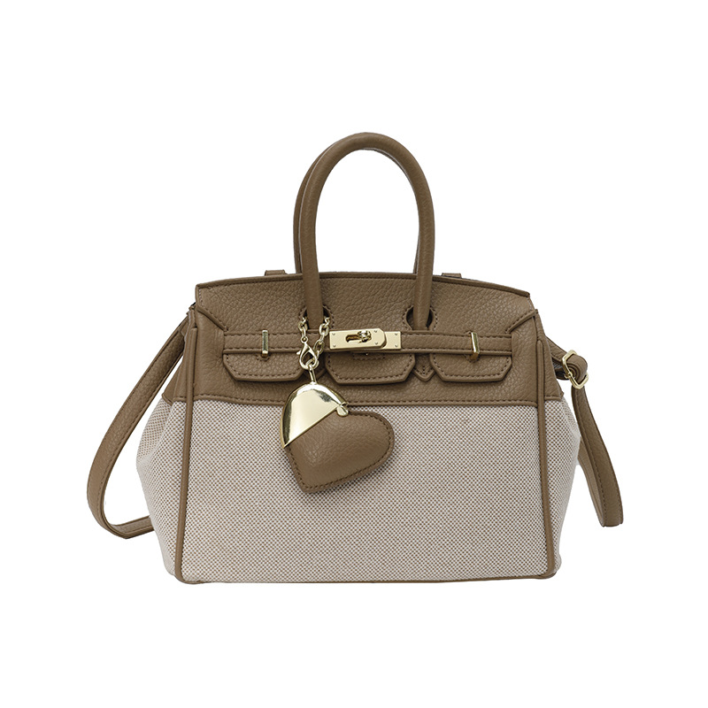 Bolso de tela de mujer color contrastante empalme bolso portátil Kylie bolsa de gran capacidad transfronteriza alta sensación de viaje bolsa de mano