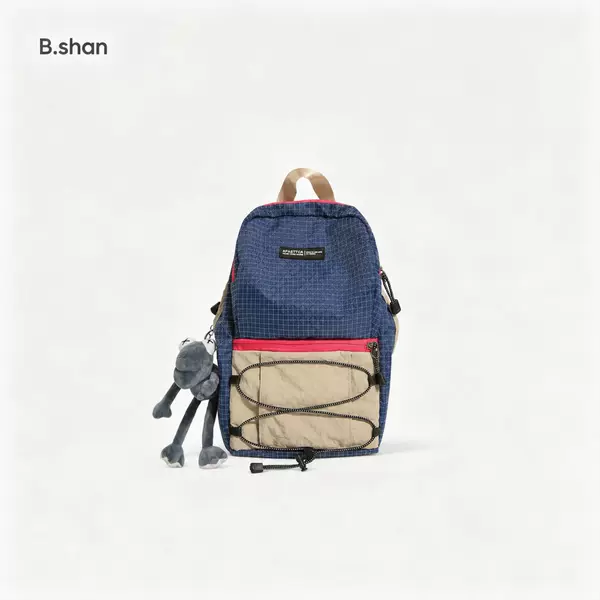 Ins-style plaid color-blocking outdoor children's backpack, lightweight drawstring pendant school bag, casual backpack for boys and girls for outings