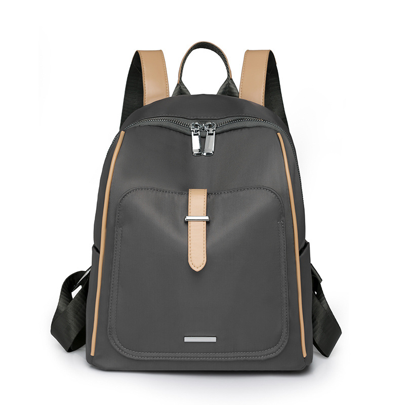 Mochila de nailon para mujer 2024 nuevo estilo casual mochila escolar de color sólido moda color de contraste ligero y versátil mochila de viaje de viaje