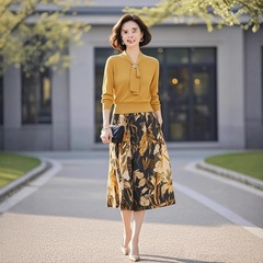 黄色针织套装2025年女装春季新款高级感系带上衣印花半身裙两件套