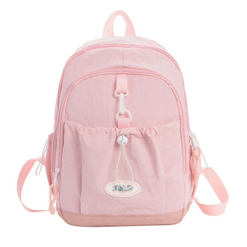 Coreana simple color sólido mochila de niños y niñas de gran capacidad mochila escolar 2026 nueva mochila de niños de cuerda