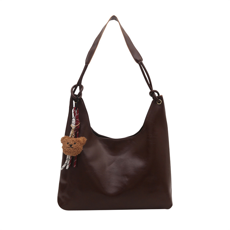 Bolso de brazo retro para mujeres 2025 primavera nueva moda hollow coreana bolso especial de gran capacidad empalmado bolso de hombro