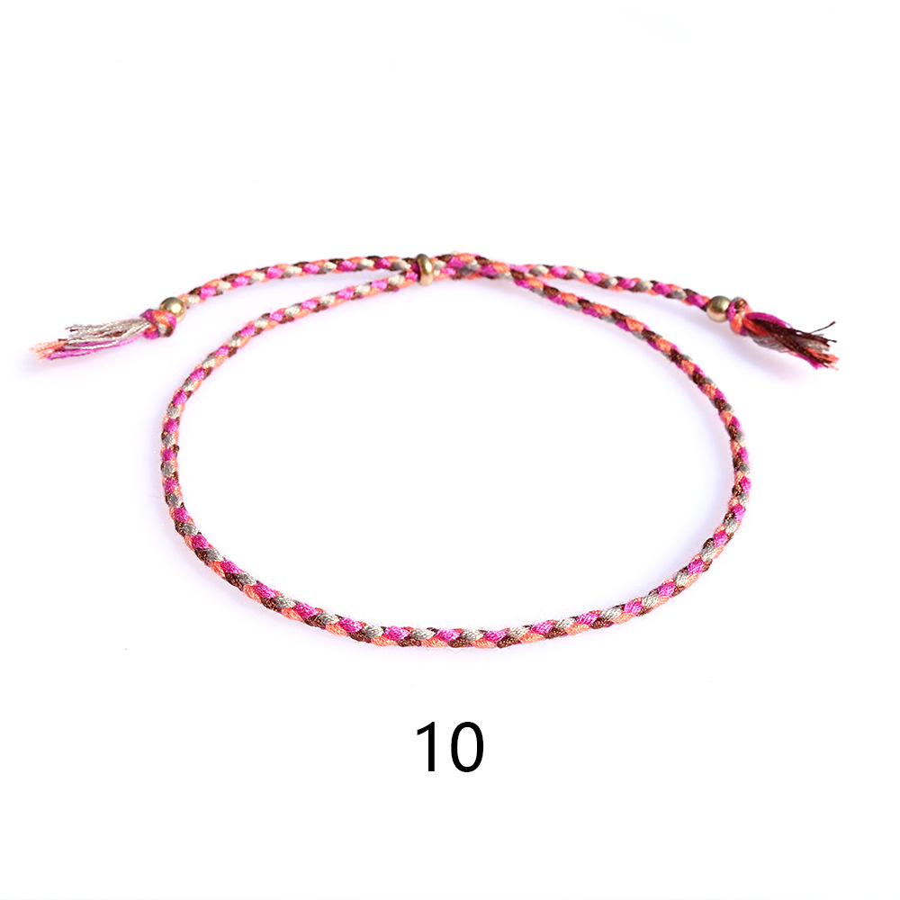 Amazon popular colorido cuerda de algodón amistad pulsera perlas de cobre borla pulsera tejida a mano ajustable hombres y mujeres pulsera