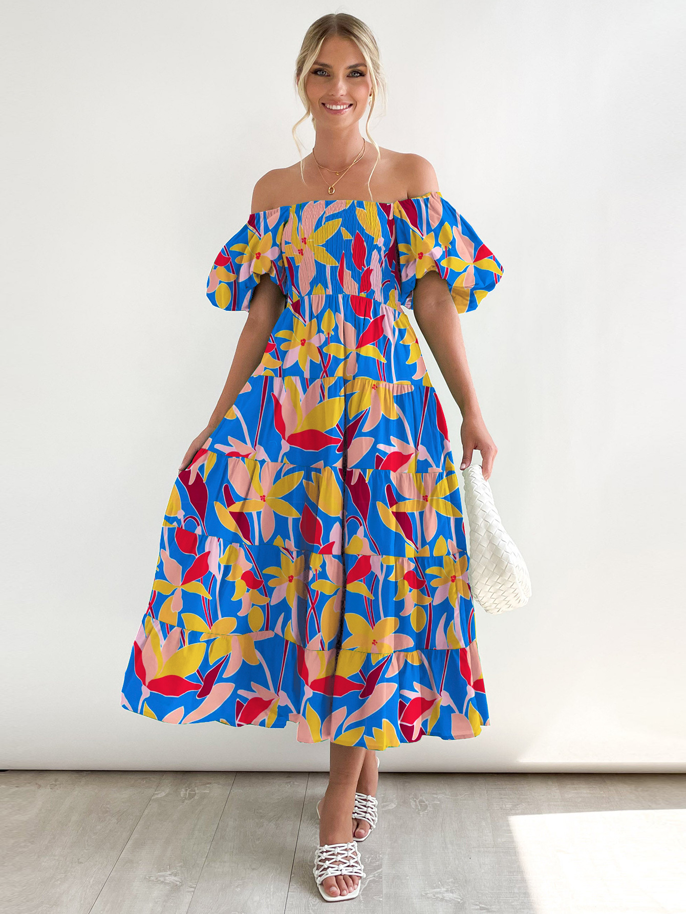 Big red and yellow flowers on blue bottom