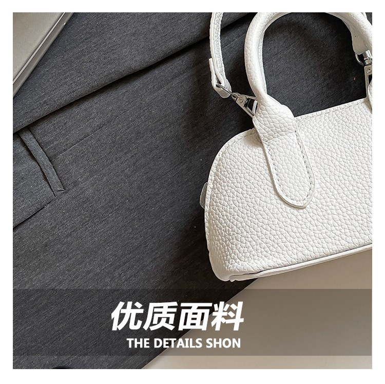 A simple and individual hand-held shell bag, a new Spring/Summer 2025 niche fashion casual shoulder bag, a trendy and stylish crossbody bag Item Picture