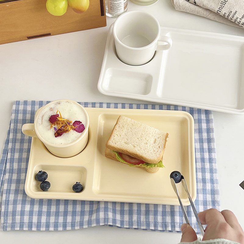 Korean breakfast plate in creamy yellow, ceremonial ceramic tray, high-value coffee and milk cup, popular online set for one person