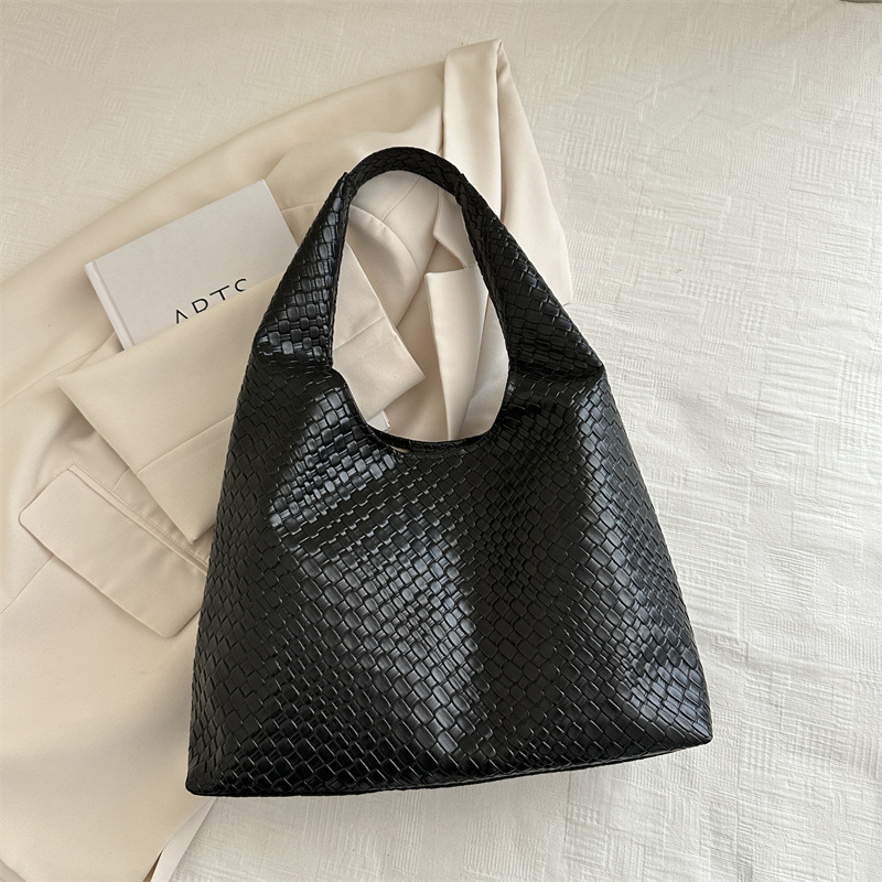 Otoño y invierno retro bolsos de dos piezas 2024, bolsos de moda de mujer, bolsos de hombro portátiles extranjeros, bolsos simples.