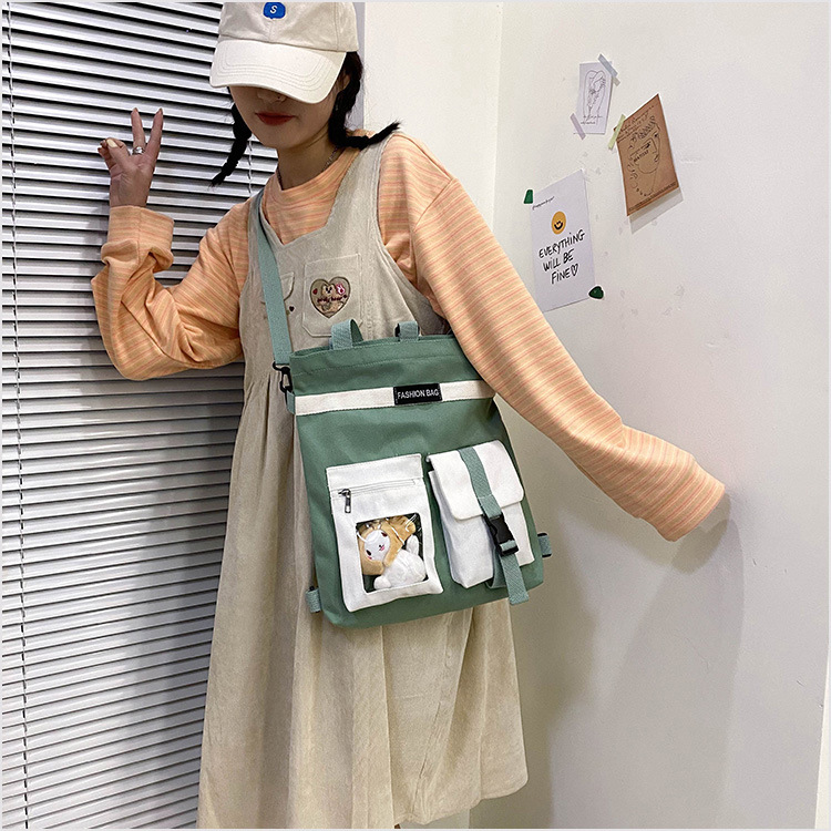 Factory wholesale 2021 new Korean-style canvas handbags, large-capacity multi-functional student cloth bags, four-use bags undefined