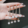 Small design long sophisticated earrings with tassels from pearl, trend of season, wholesale