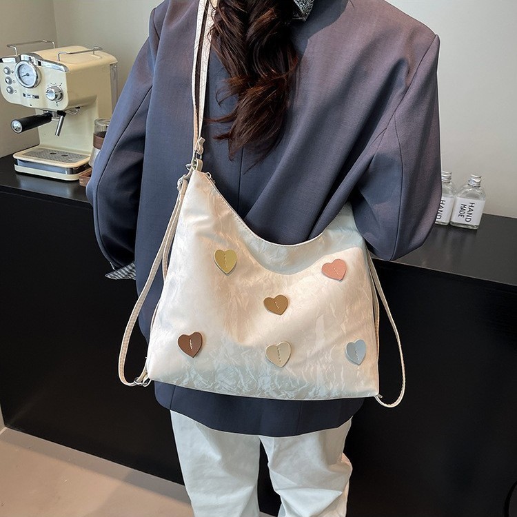 韓国版の女性用トートバッグ新しい大容量多機能三目的バックパックレトロニッチクロスボディショルダーバッグ|undefined