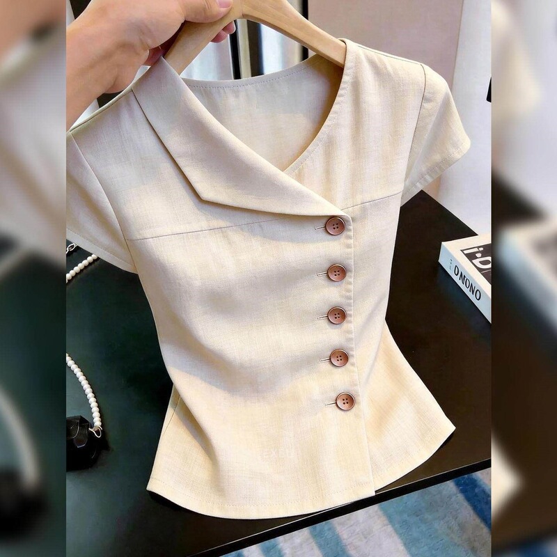 Summer new style, chic and mature short-sleeved shirt for women, apricot color, with asymmetrical buttons, slimming effect, and a sophisticated look Summer new style, chic and mature short-sleeved shirt for women, apricot color, with asymmetrical buttons, slimming effect, and a sophisticated look