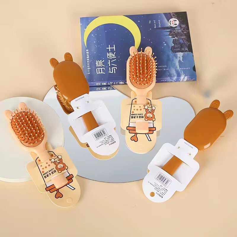 新商品のキャンディー色のエアクッションの美容櫛の少女のかわいい女の子の携帯の小さい櫛のエアバッグは櫛の卸売りをマッサージします。|undefined