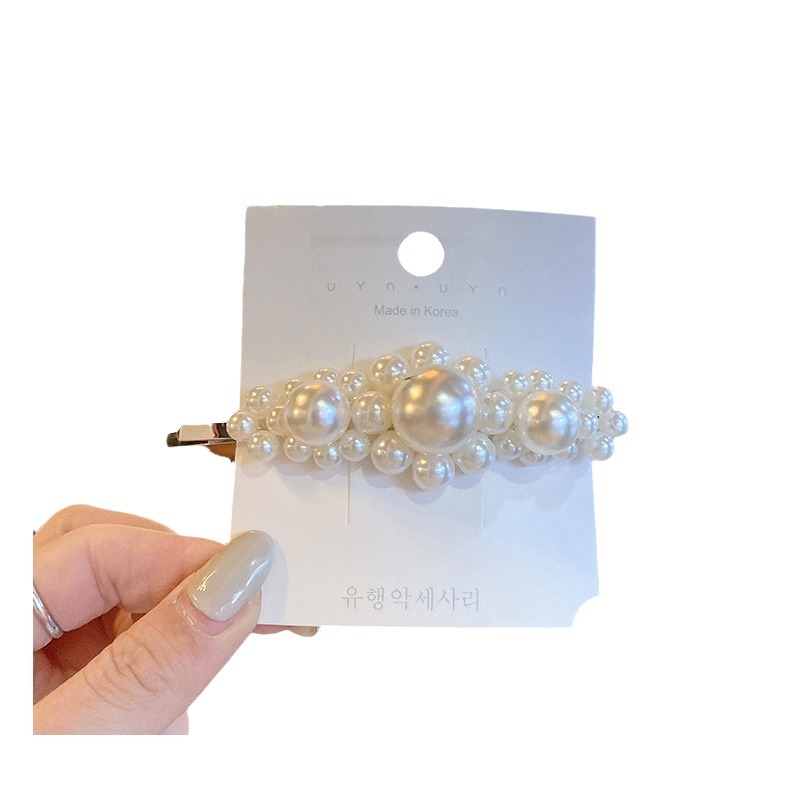 Corea del Sur clip para el cabello de perlas en línea clip para el cabello de mujeres rasgadas clip para el cabello de una palabra clip para el cabello de bordes fría BB clip lateral clip para el temperamento clip para la cabeza