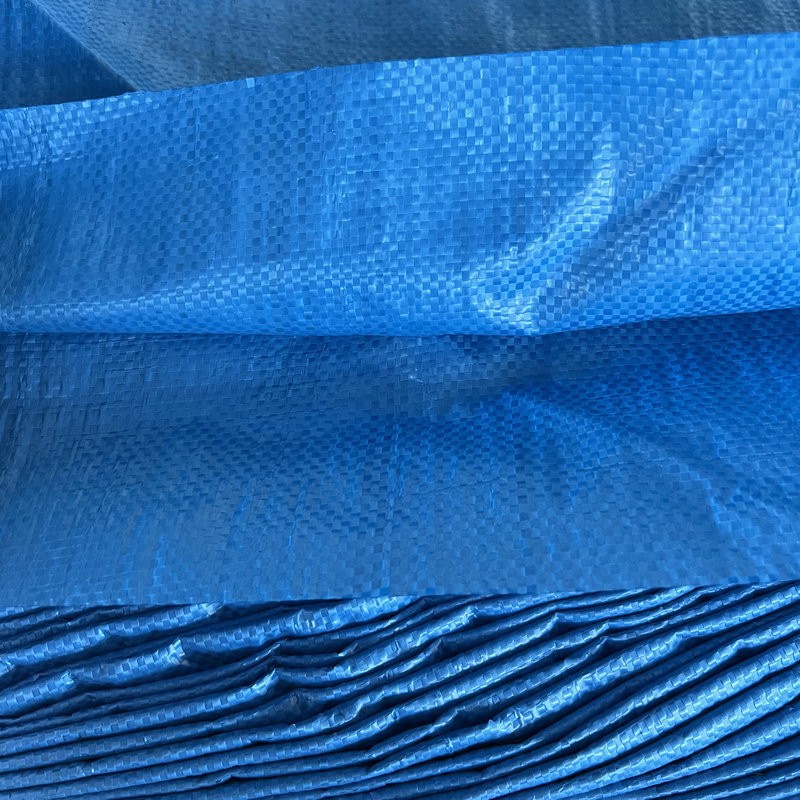 Fábrica directa Yiwu gris logística embalaje bolsa de piel de serpiente embalaje expreso bolsa tejida de plástico al por mayor en stock