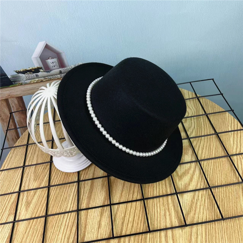 Sombrero para mujer AliExpress nueva cadena de perlas plana superior sombrero de lana elegante casual europeo y americano británico borde plano retro sombrero