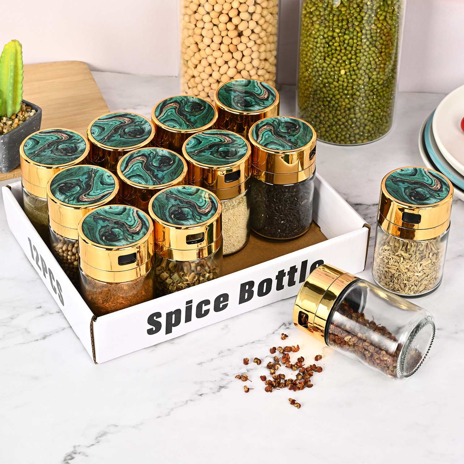 Venta caliente transfronteriza cocina de acero inoxidable Luz de lujo de vidrio condimento tarro traje hogar sellado de vidrio condimento tarro al por mayor