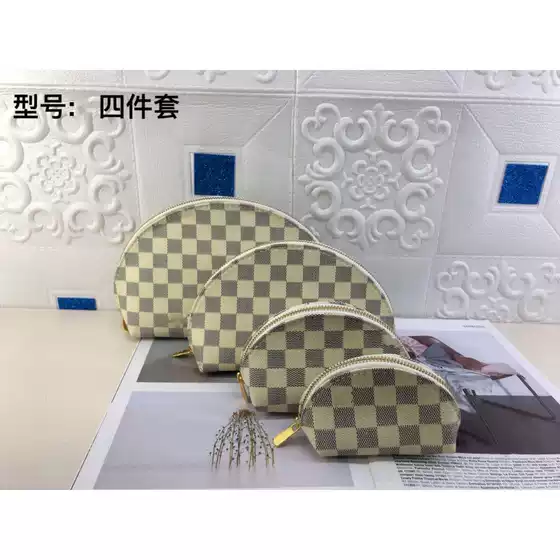 2023 New European and American Fashion All-match Chessboard Makeup Newspaper Four-piece Foreign Trade Bag Simple Storage Bag