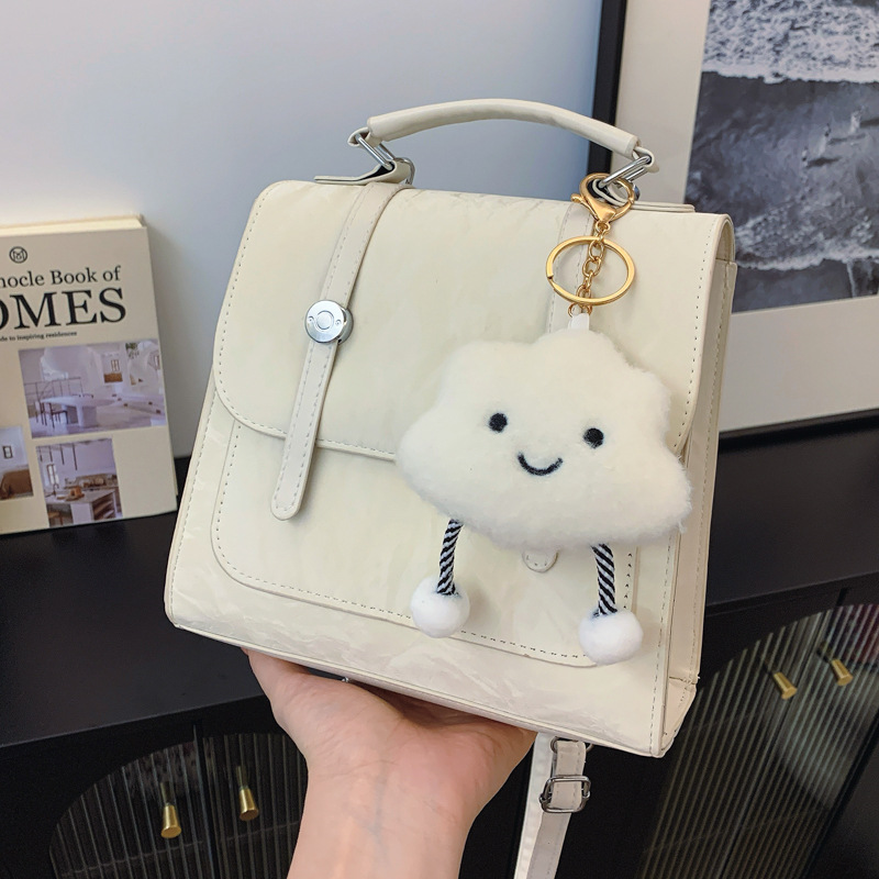 Mochila pequeña 2024 nuevo estilo de diseño de moda nicho de viaje bolsas escolares ligeras para mujeres ins para salir mochila pequeña