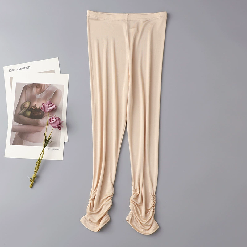 Silk leggings, elastic trousers, hip-accented