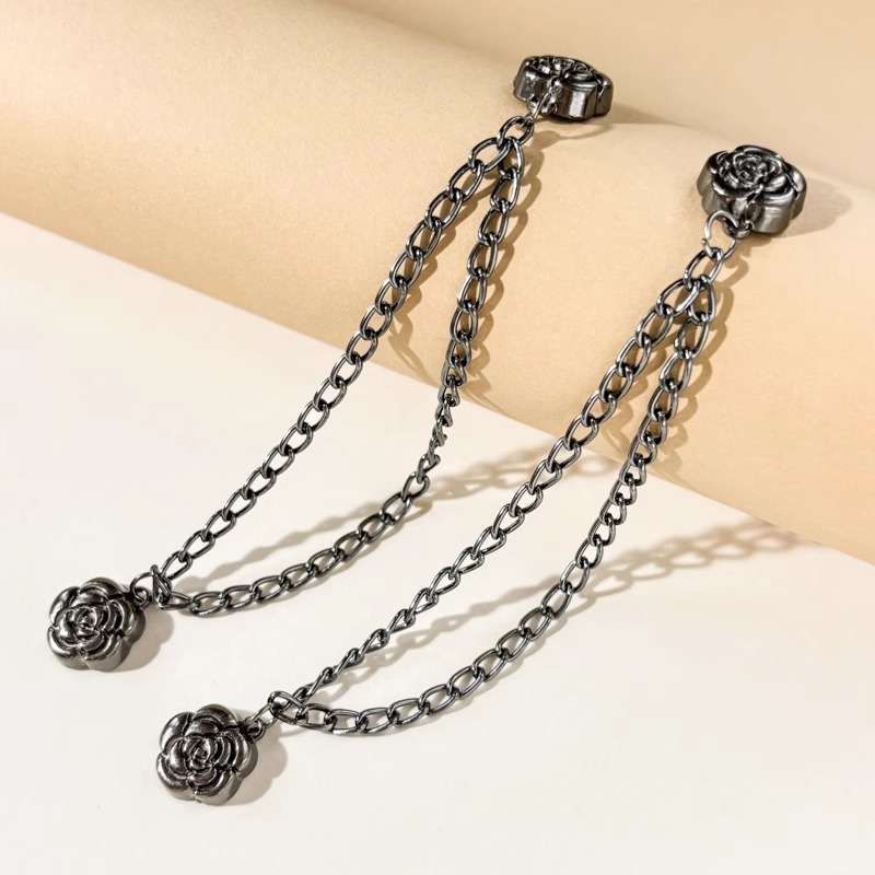 Esquina de la camiseta, peldaño apretado, artefacto corto, botones de nudos, mangas fijas, pantalones fijos, pies, cadena anti-flip, botones de succión magnéticos