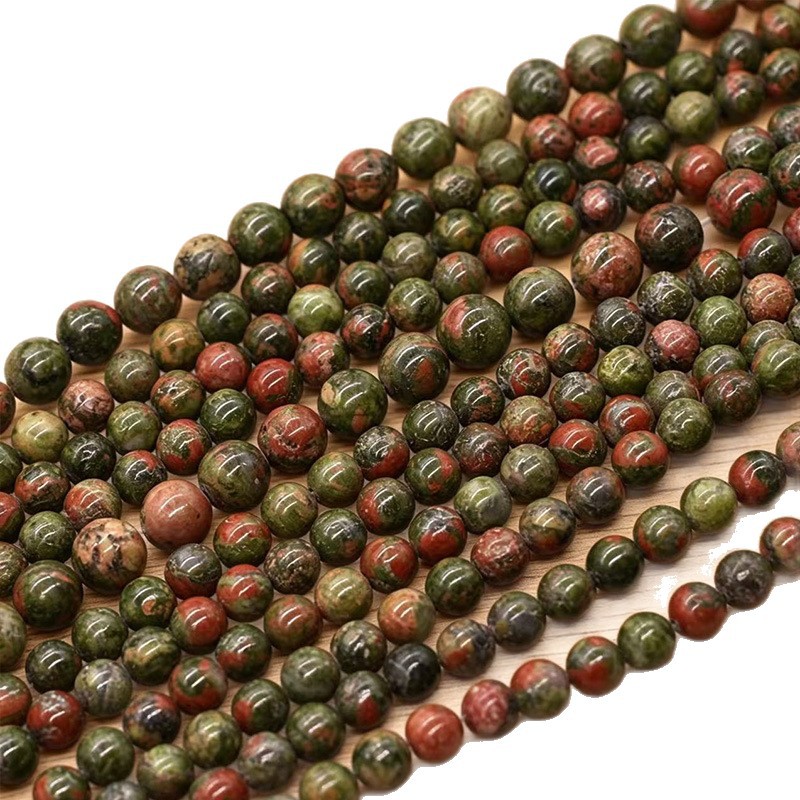 Los fabricantes suministran directamente collares de pulsera de cuentas dispersas de cuentas redondas de esmeralda natural DIY joyas semiacabadas al por mayor