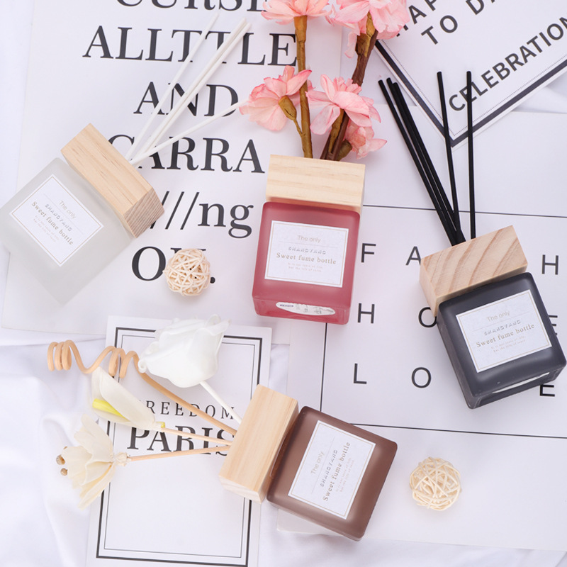 Botella de aromaterapia sin fuego de vidrio cuadrado 100mL botella vacía decoración del hogar coche fragancia perfume expansión sub-botella de aceite esencial