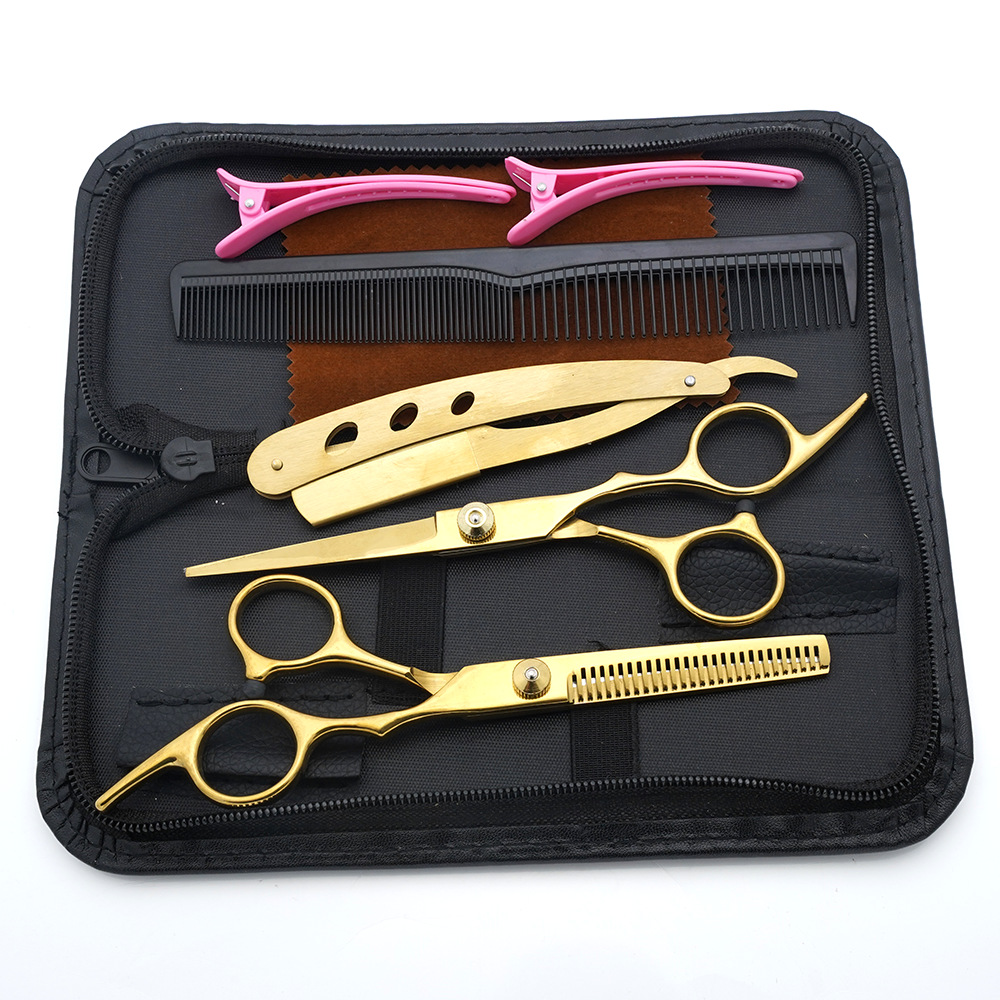 Tijeras de peluquería de 6 pulgadas, negras y doradas, con mango inclinado y de alta calidad, juego de tijeras de peluquería al por mayor para cortar el cabello.