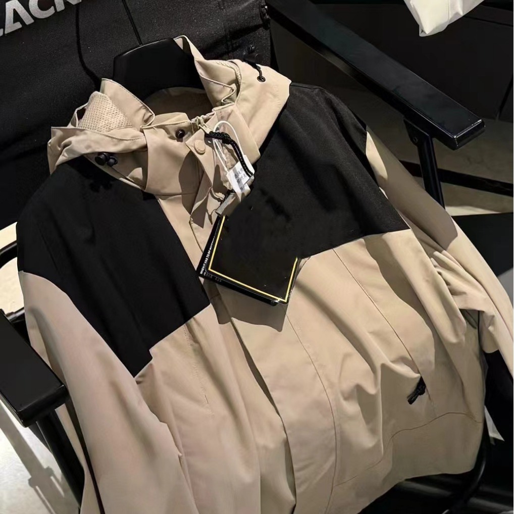 Chaquetas de costura modelos de primavera y otoño impermeables y a prueba de viento para hombres y mujeres del mismo estilo chaqueta de pareja gabardina de nicho