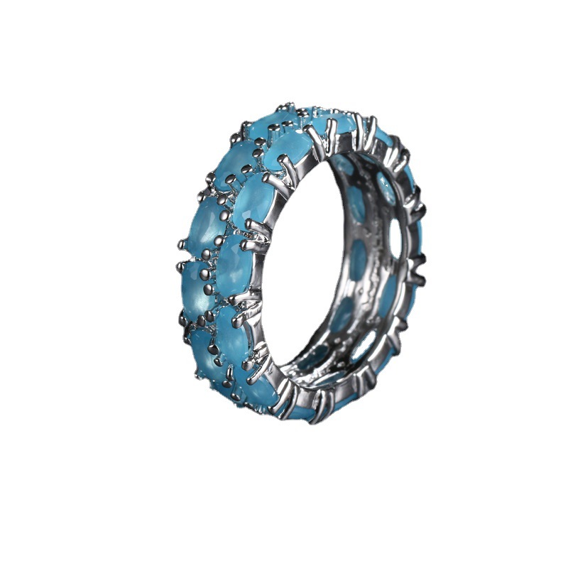 blue ring with stone with zircon