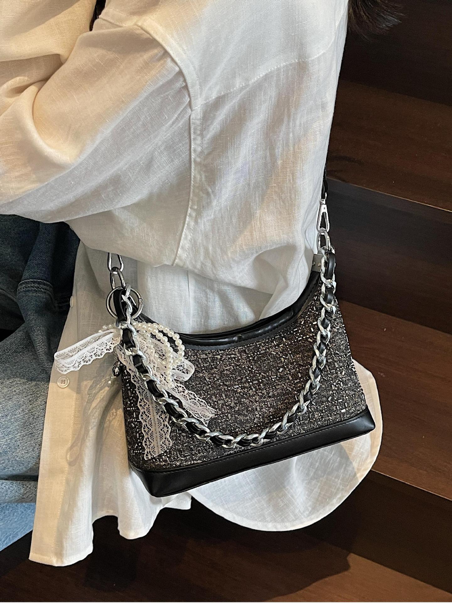Bolso de axila de cadena de diamantes calientes de verano para mujer 2025 nuevo bolso de hombro de moda de moda bolsa de mensajero de moda de nicho