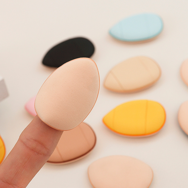 Fabricantes Pulgar Puff Mini Mini Pequeño Cojín de aire húmedo y seco Puff Gota de agua Puff de la yema del dedo Producción y venta al por mayor