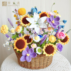 手作りの毛糸の花を編んで花束を編みます。