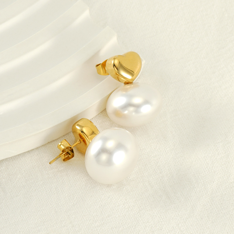 Francés retro de acero inoxidable precioso perla pendientes de titanio de acero diseño chapado en oro elegante todo-fósforo pendientes simples para las mujeres