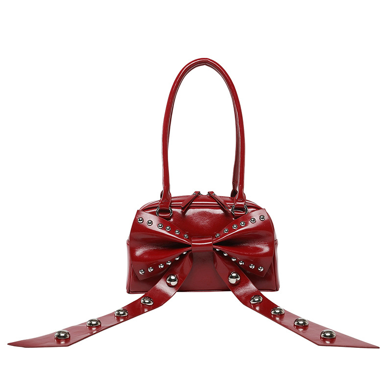 Bolso de axila de textura de alta calidad 2025 verano nuevo bolso femenino lindo lazo bolso de hombro con remache personalizado