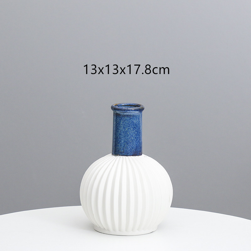 Florero de cerámica al por mayor creativo ins hogar estilo europeo del Norte simple rayado creativo Luz de lujo decoración de arte al por mayor
