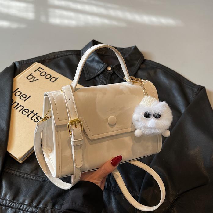 Bolso cuadrado pequeño de mano de estilo occidental de todo fósforo para mujer 2025 nuevo bolso de viaje de ocio ligero bolso de mensajero simple de sentido avanzado